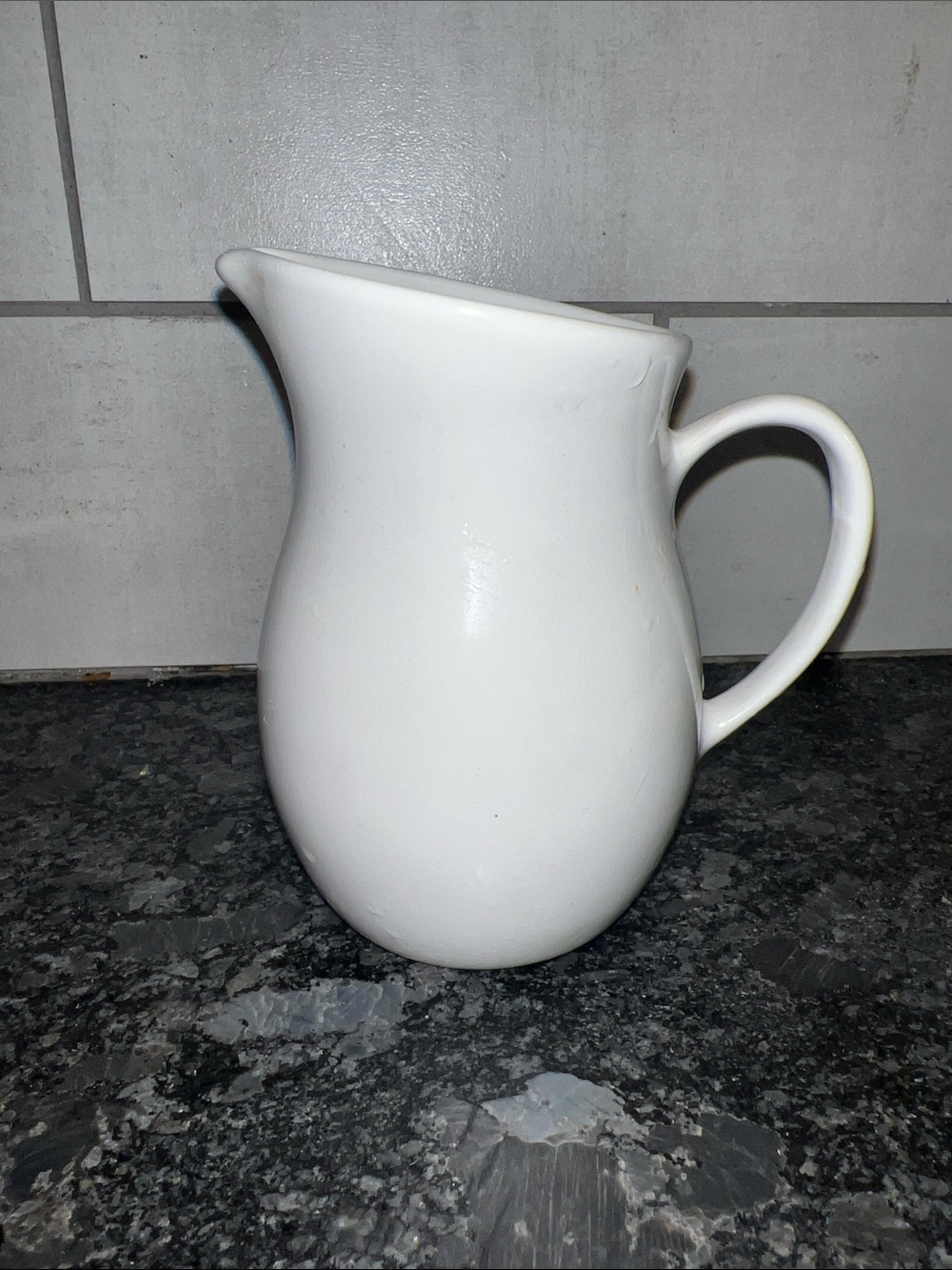 Corning Centura White Ceramic Milk/Creamer. Exc condition Goes with all patterns